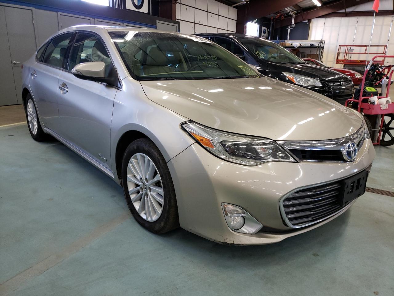 TOYOTA AVALON HYB 2013 with VIN 4T1BD1EB5DU016959 - Photo from auction