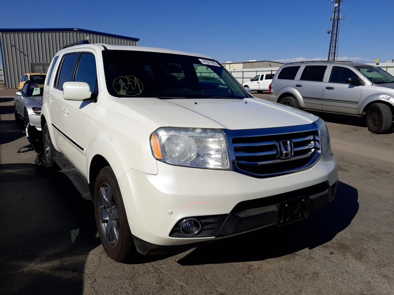 HONDA PILOT TOUR 2013 with VIN 5FNYF3H98DB017951 - Photo from auction