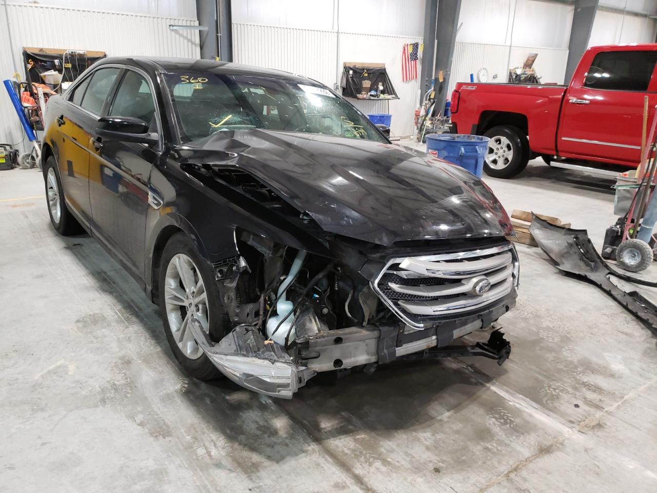 FORD TAURUS SEL 2016 with VIN 1FAHP2E86GG156334 - Photo from auction
