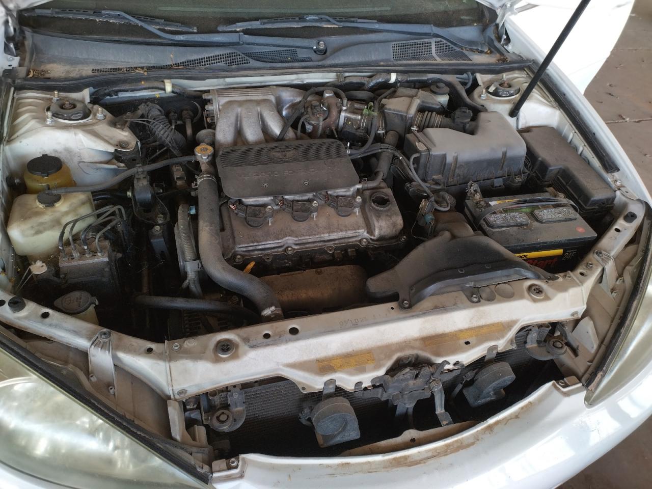 Photo 7 from auction – 2003 TOYOTA CAMRY LE with VIN 4T1BF30K73U042152