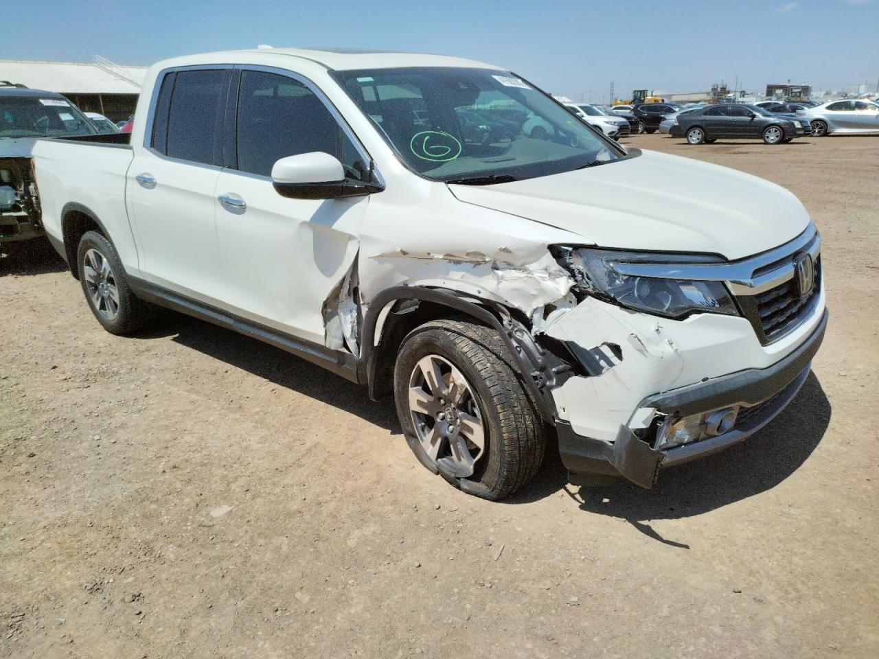 HONDA RIDGELINE 2019 with VIN 5FPYK3F73KB025540 - Photo from auction
