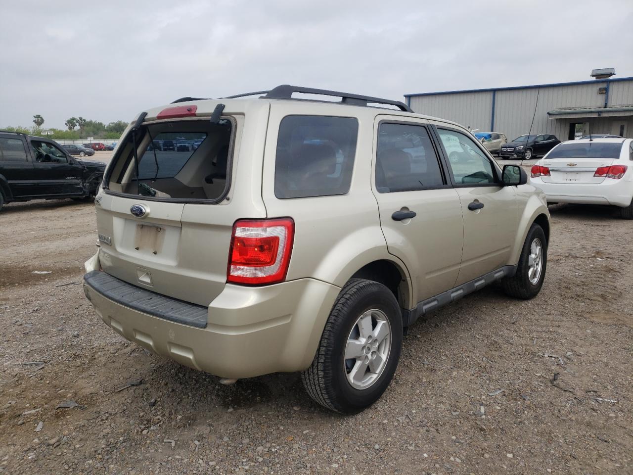 Photo 4 from auction – 2010 FORD ESCAPE XLS with VIN 1FMCU0C72AKD32498