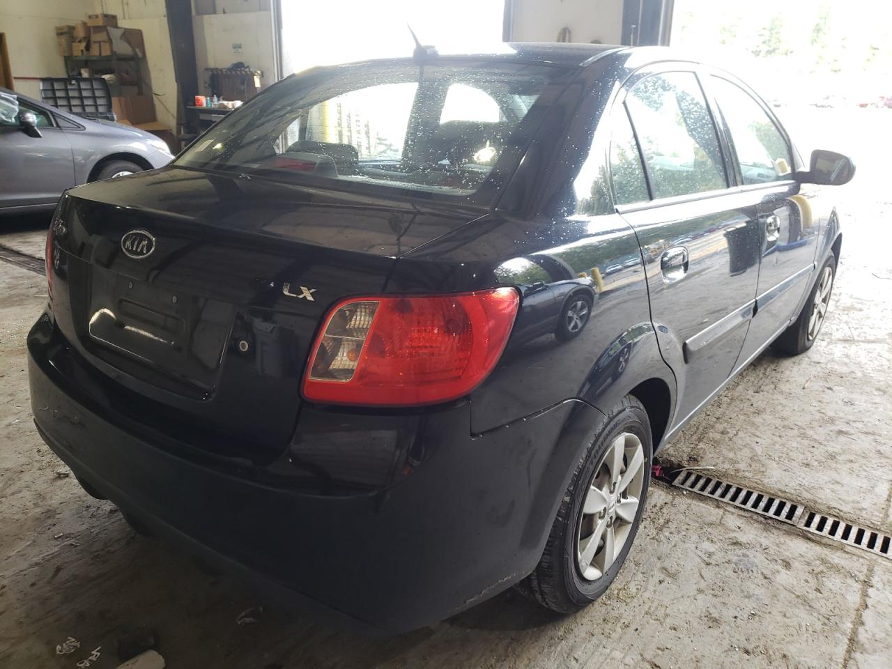 Photo 4 from auction – 2011 KIA RIO BASE with VIN KNADH4A36B6932842