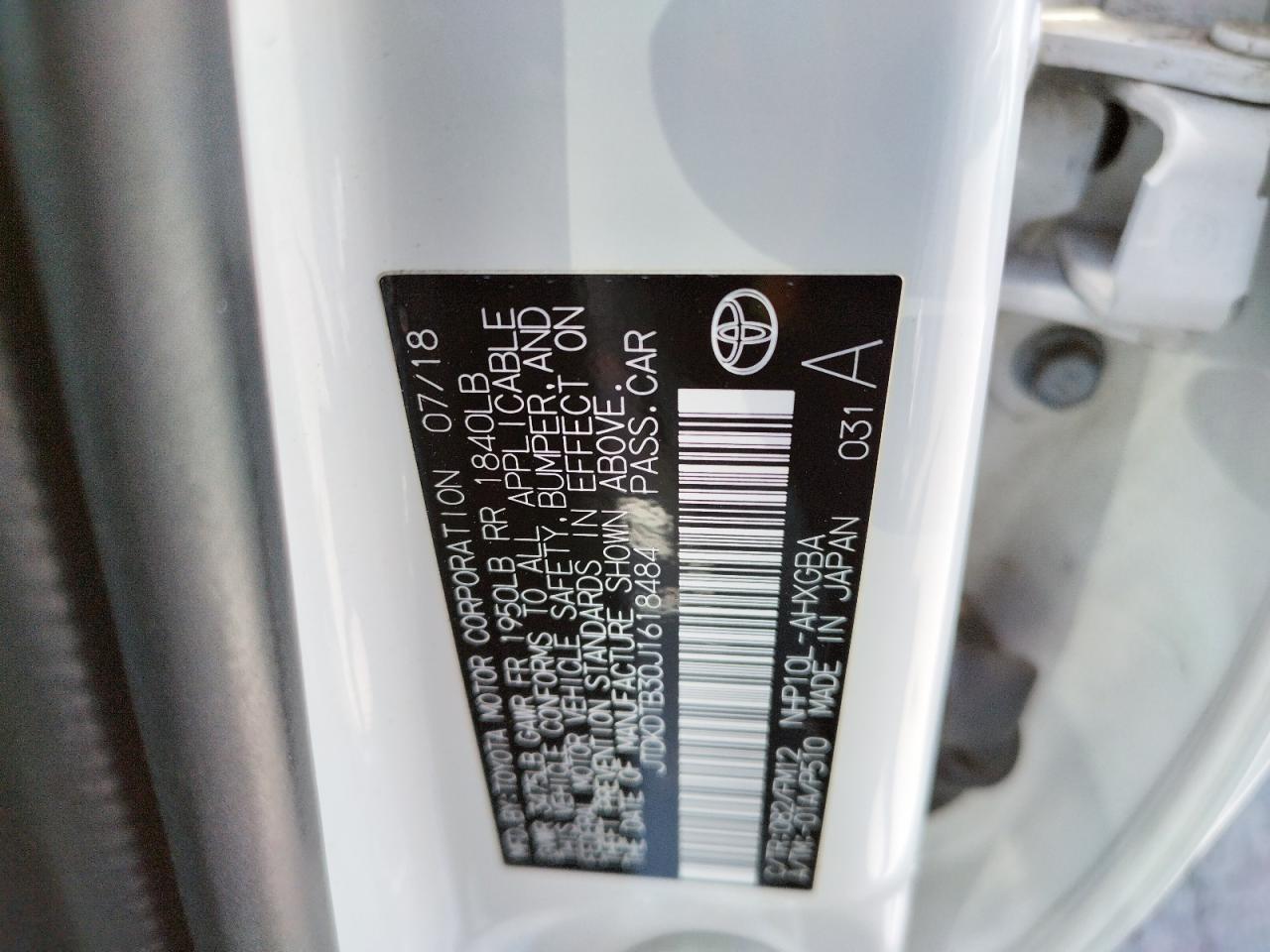 Photo 10 from auction – 2018 TOYOTA PRIUS C with VIN JTDKDTB30J1618484