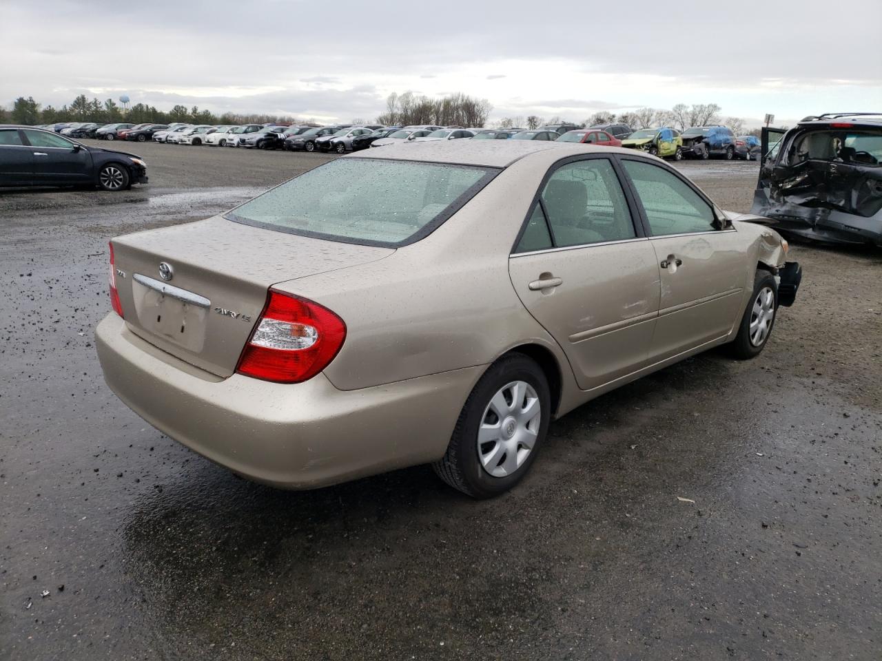 Photo 4 from auction – 2003 TOYOTA CAMRY LE with VIN 4T1BE30KX3U698154