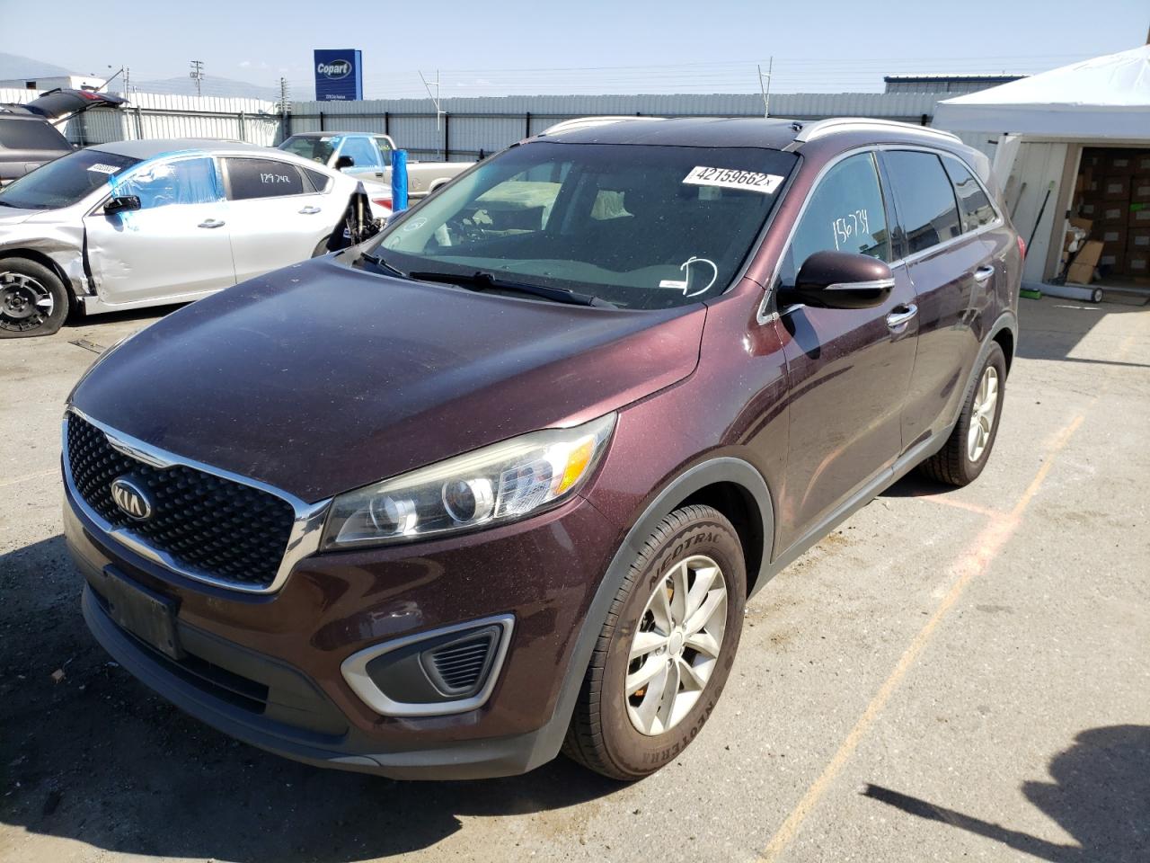 Photo 2 from auction – 2016 KIA SORENTO LX with VIN 5XYPG4A53GG066462