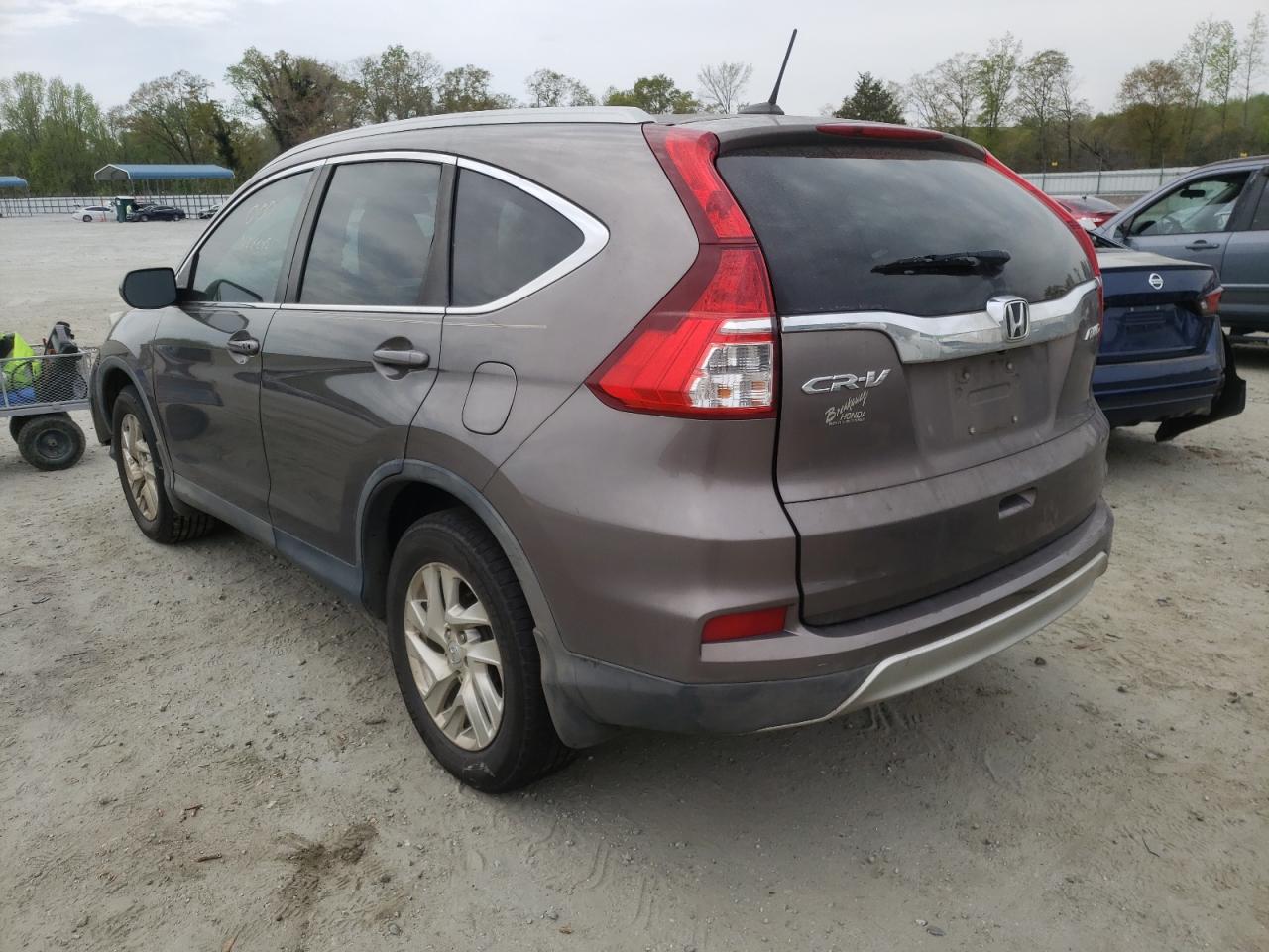 Photo 3 from auction – 2016 HONDA CR-V EXL with VIN 5J6RM4H70GL061825
