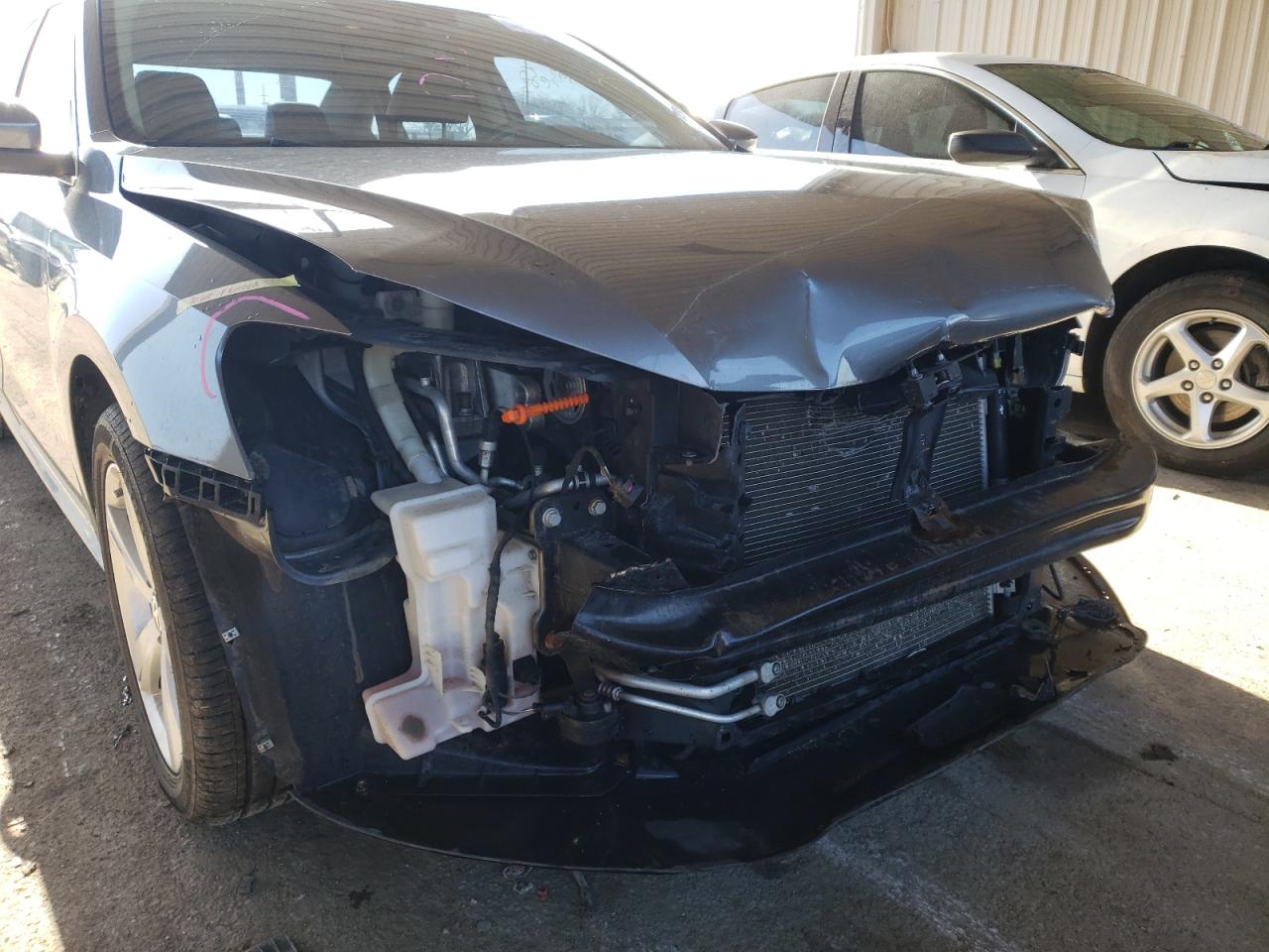 Photo 9 from auction – 2012 VOLKSWAGEN PASSAT SE with VIN 1VWBP7A34CC105338