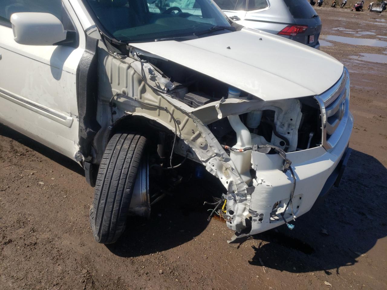 Photo 9 from auction – 2011 HONDA PILOT TOUR with VIN 5FNYF4H96BB080789