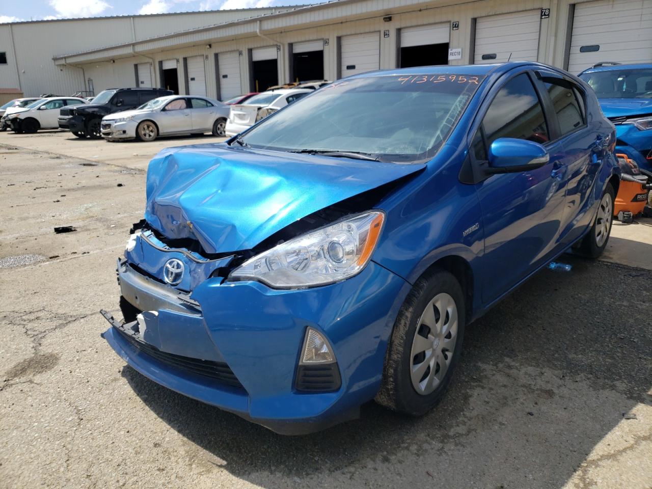 Photo 2 from auction – 2014 TOYOTA PRIUS C with VIN JTDKDTB37E1571296