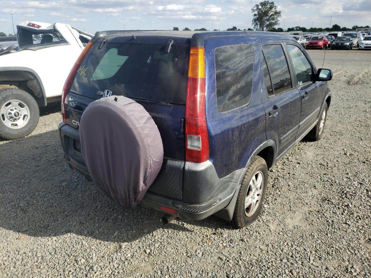 Photo 4 from auction – 2002 HONDA CR-V EX with VIN JHLRD78882C041060