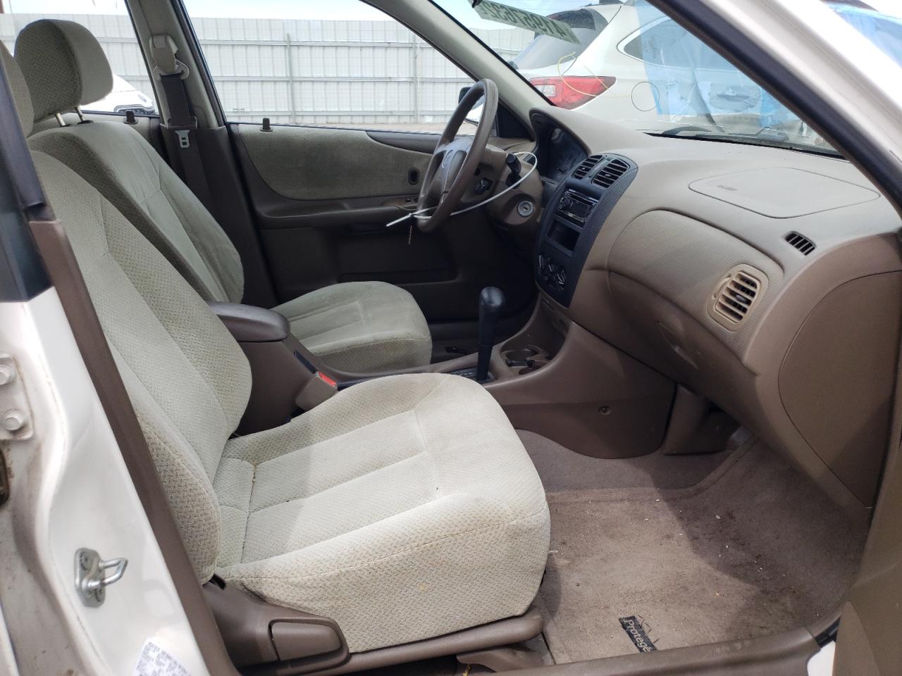 Photo 5 from auction – 1999 MAZDA PROTEGE DX with VIN JM1BJ2225X0153614