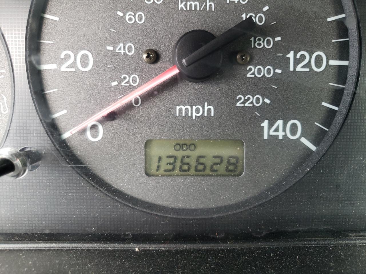 Photo 8 from auction – 1999 MAZDA PROTEGE DX with VIN JM1BJ2225X0153614
