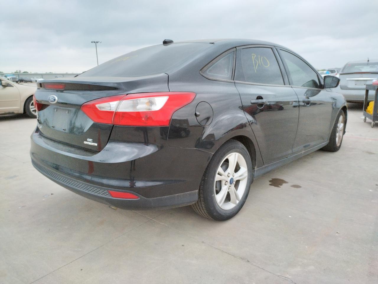 Photo 4 from auction – 2014 FORD FOCUS SE with VIN 1FADP3F24EL372203