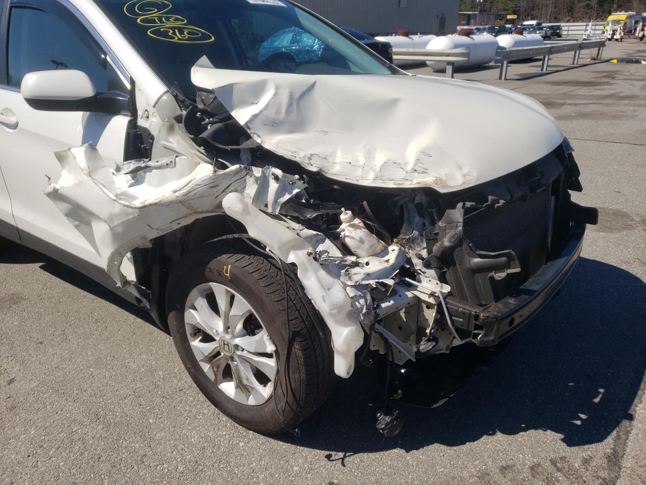 Photo 9 from auction – 2014 HONDA CR-V EX with VIN 5J6RM4H56EL019459
