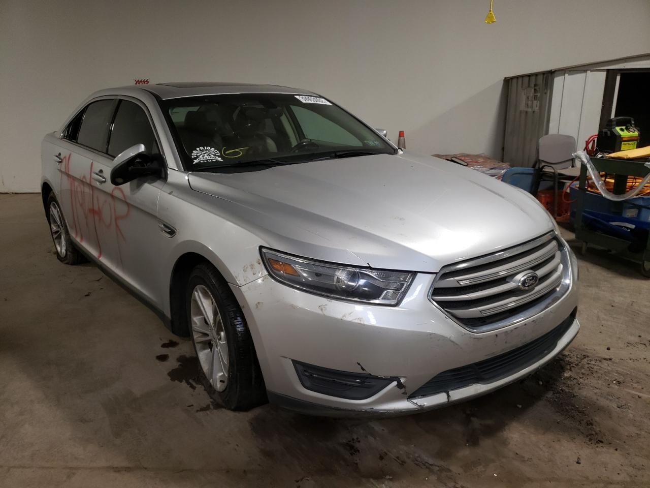 FORD TAURUS SEL 2013 with VIN 1FAHP2E90DG181198 - Photo from auction
