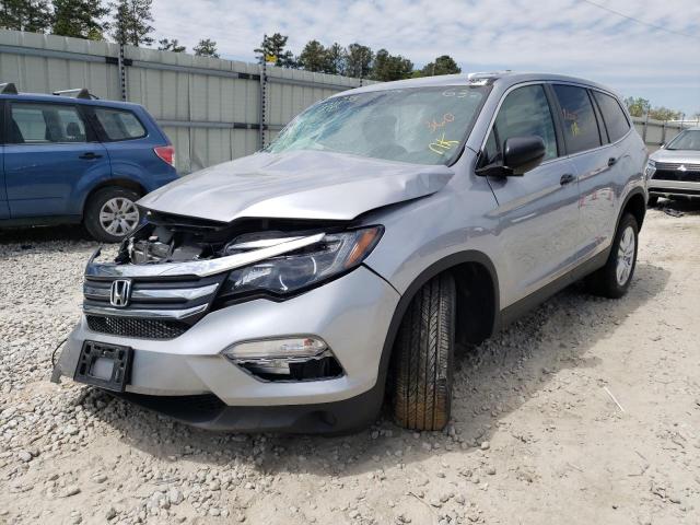Photo 2 from auction – 2018 HONDA PILOT LX with VIN 5FNYF6H17JB054321