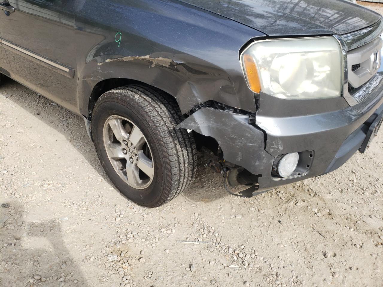 Photo 9 from auction – 2010 HONDA PILOT TOUR with VIN 5FNYF4H95AB019500