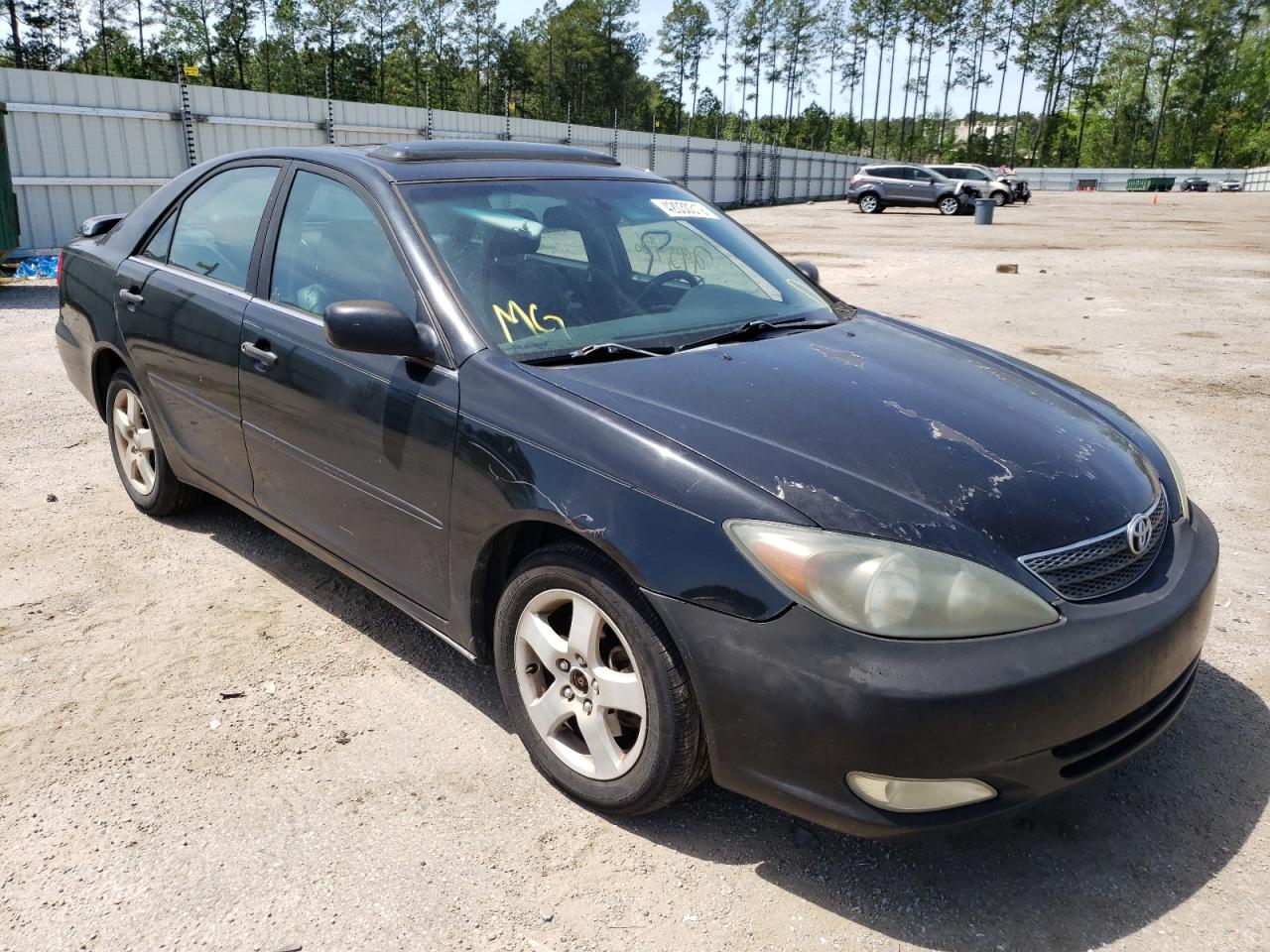 TOYOTA CAMRY LE 2002 with VIN 4T1BF32K72U016355 - Photo from auction