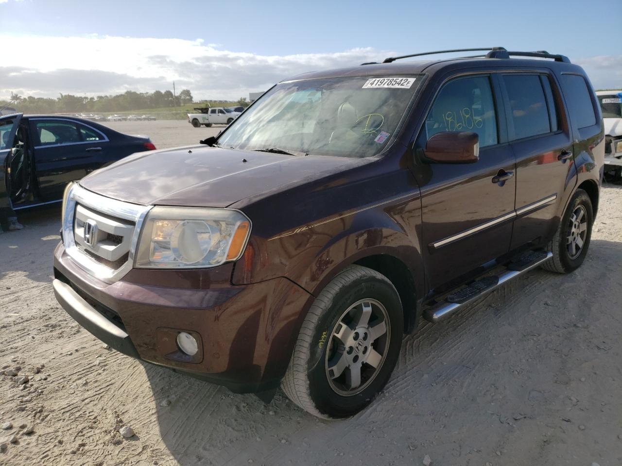 Photo 2 from auction – 2009 HONDA PILOT TOUR with VIN 5FNYF38839B011182