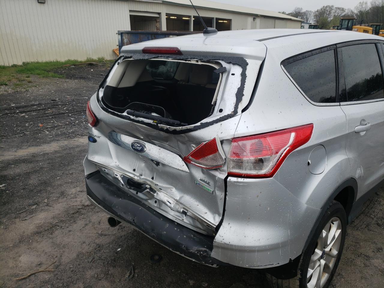 Photo 9 from auction – 2013 FORD ESCAPE SEL with VIN 1FMCU0H95DUA34563
