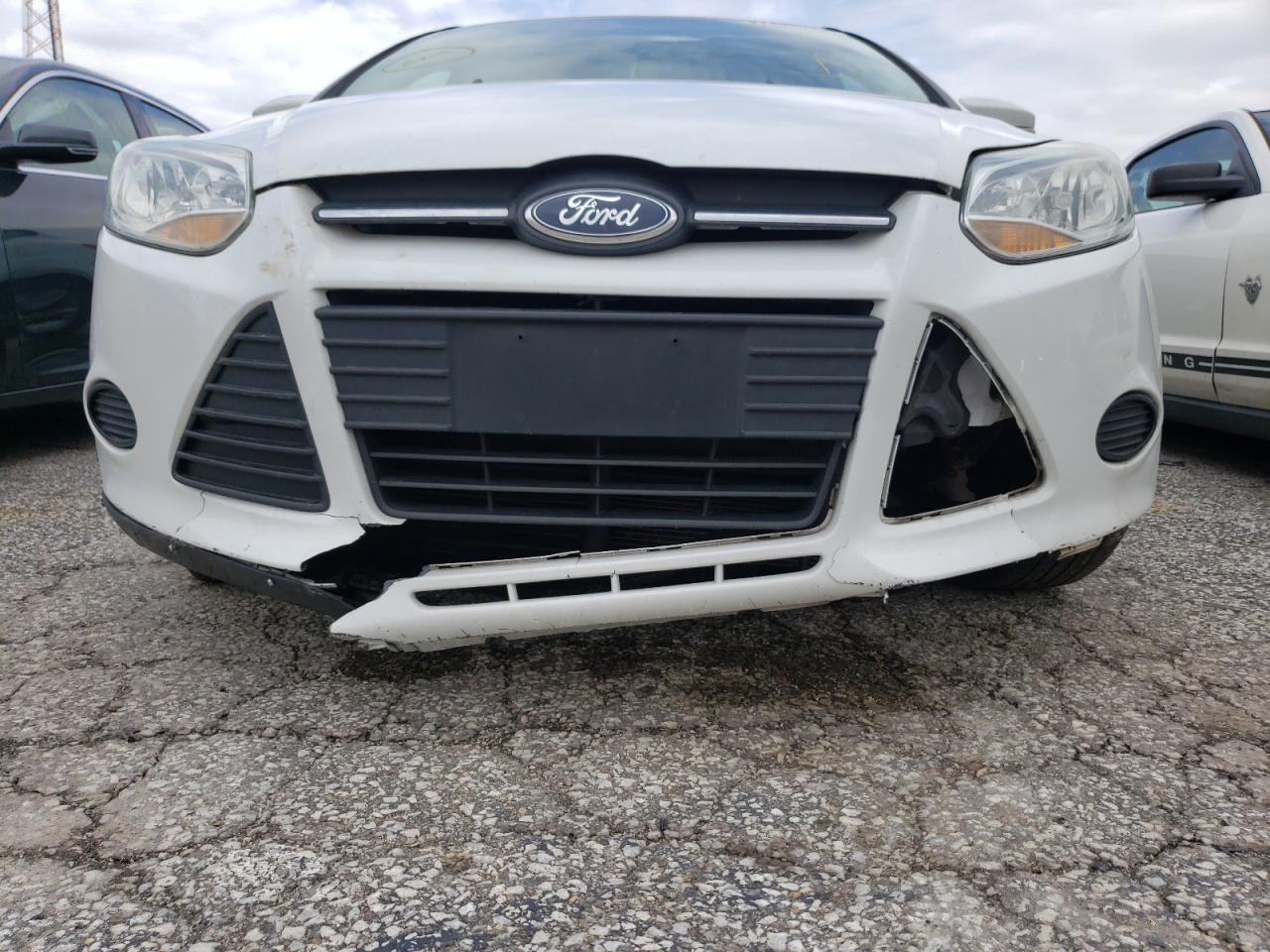 Photo 9 from auction – 2014 FORD FOCUS SE with VIN 1FADP3F29EL258214