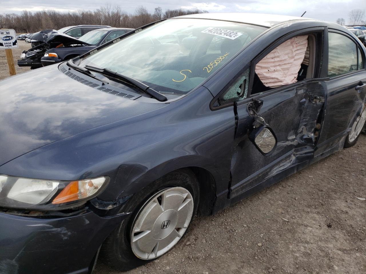 Photo 10 from auction – 2007 HONDA CIVIC HYBR with VIN JHMFA36297S020214