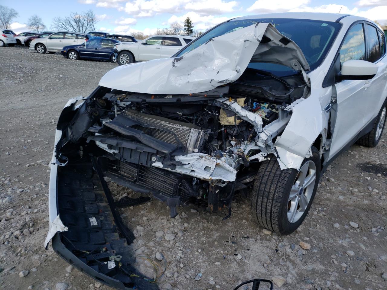 Photo 9 from auction – 2015 FORD ESCAPE SE with VIN 1FMCU9GX9FUB76924