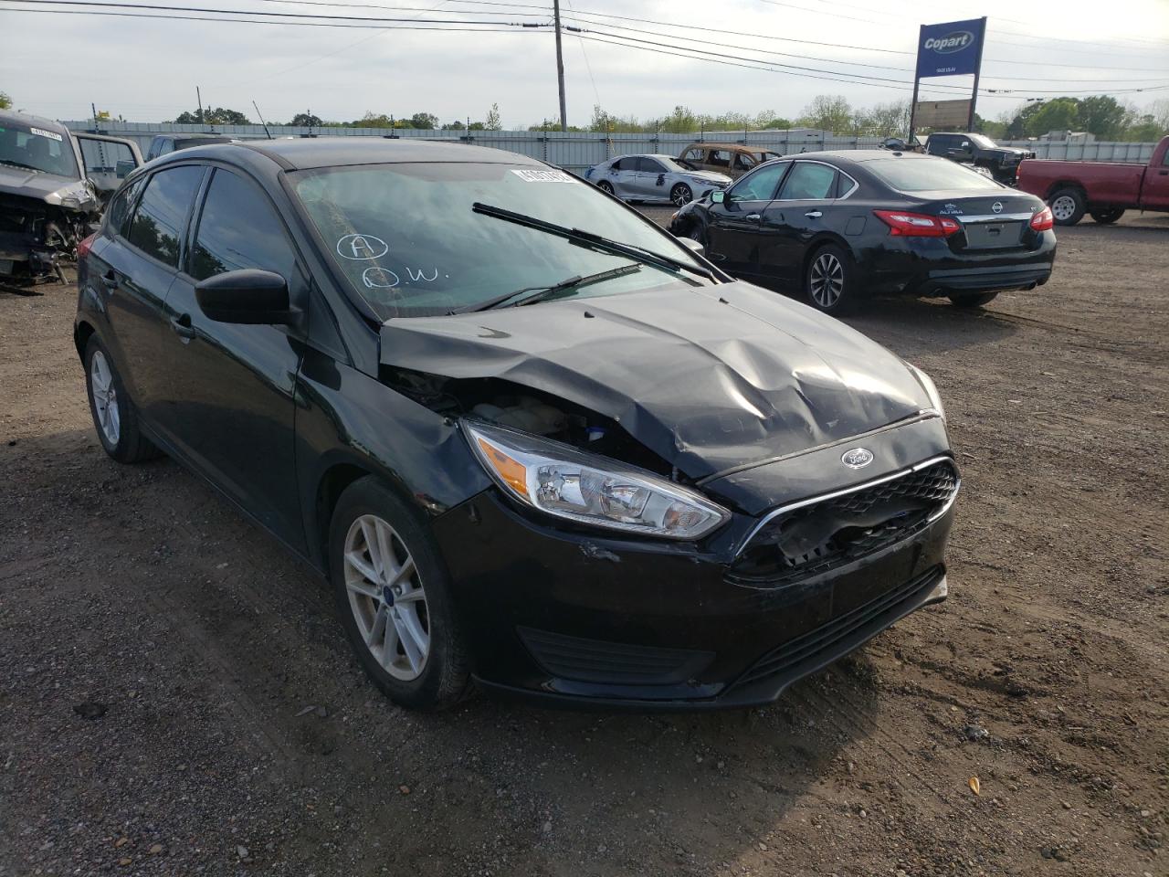FORD FOCUS SE 2018 with VIN 1FADP3K29JL214827 - Photo from auction