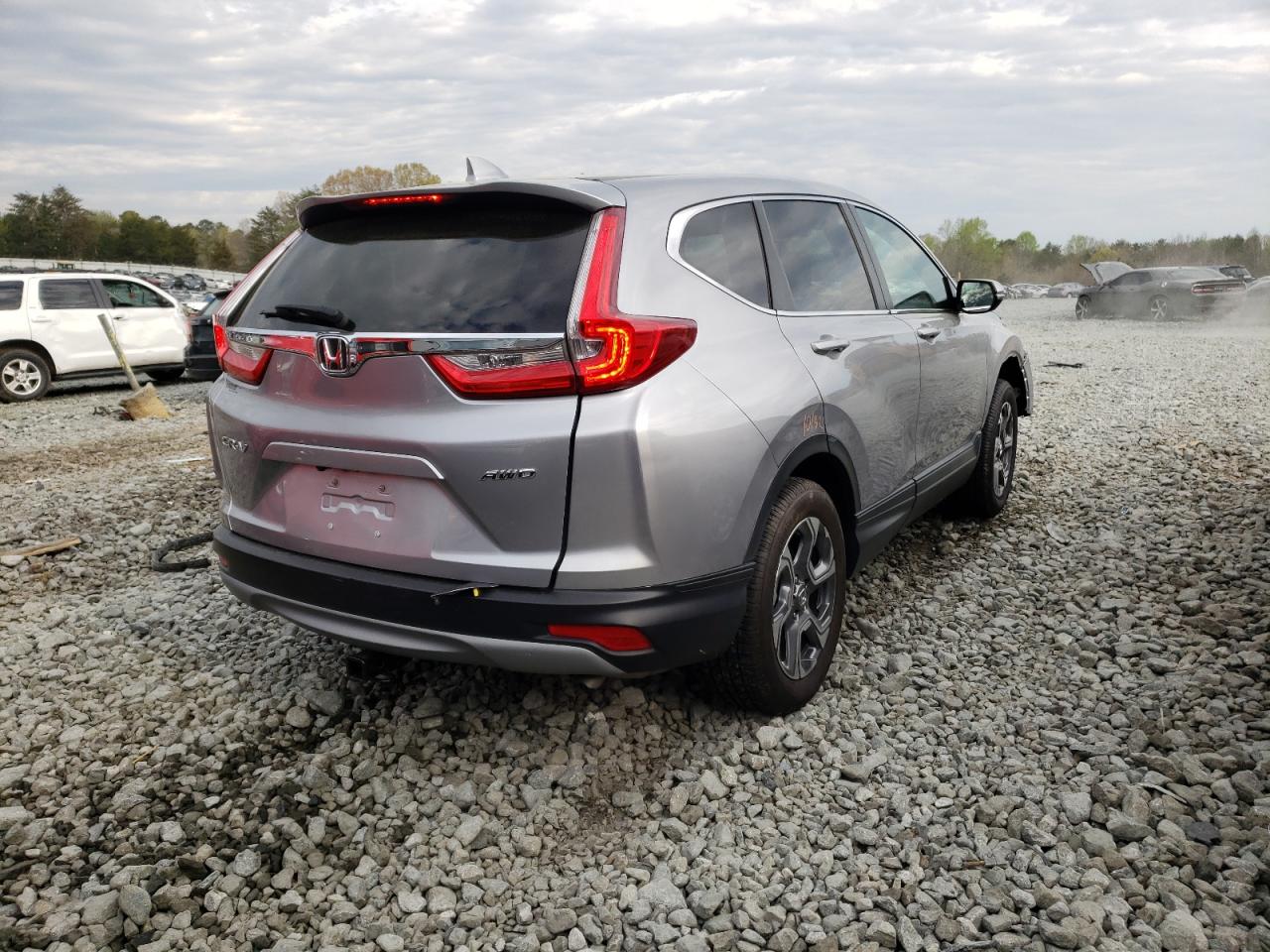 Photo 4 from auction – 2018 HONDA CR-V EX with VIN 2HKRW2H50JH620563