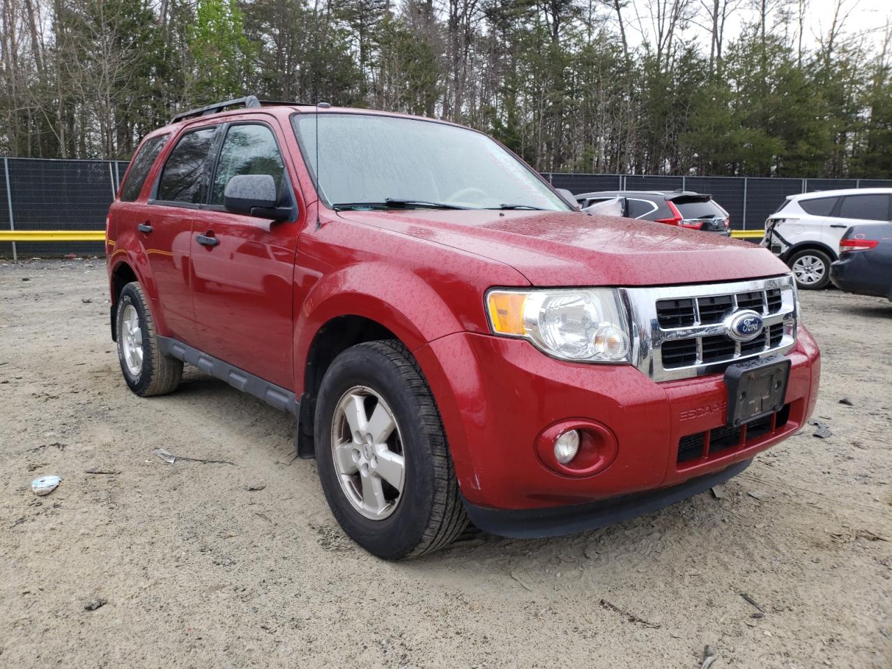 FORD ESCAPE XLT 2010 with VIN 1FMCU9D77AKD09916 - Photo from auction