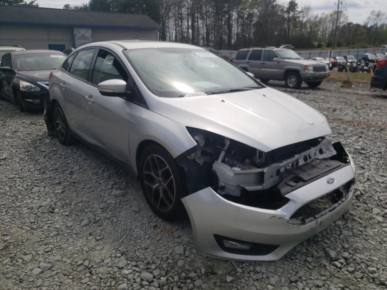 FORD FOCUS SEL 2017 with VIN 1FADP3H20HL247149 - Photo from auction
