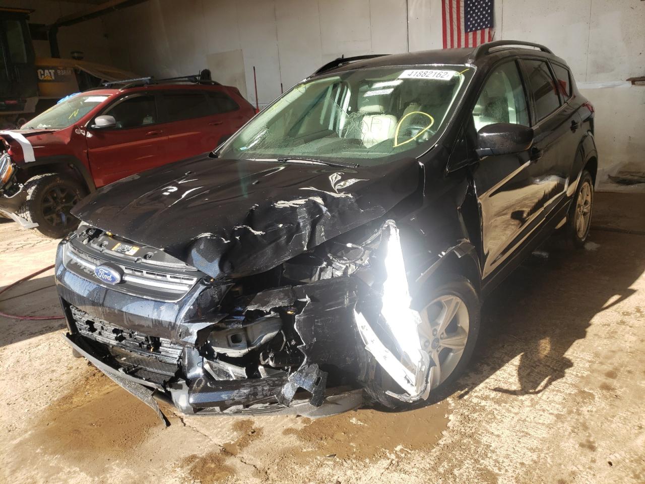 Photo 2 from auction – 2014 FORD ESCAPE SE with VIN 1FMCU9G92EUB34529