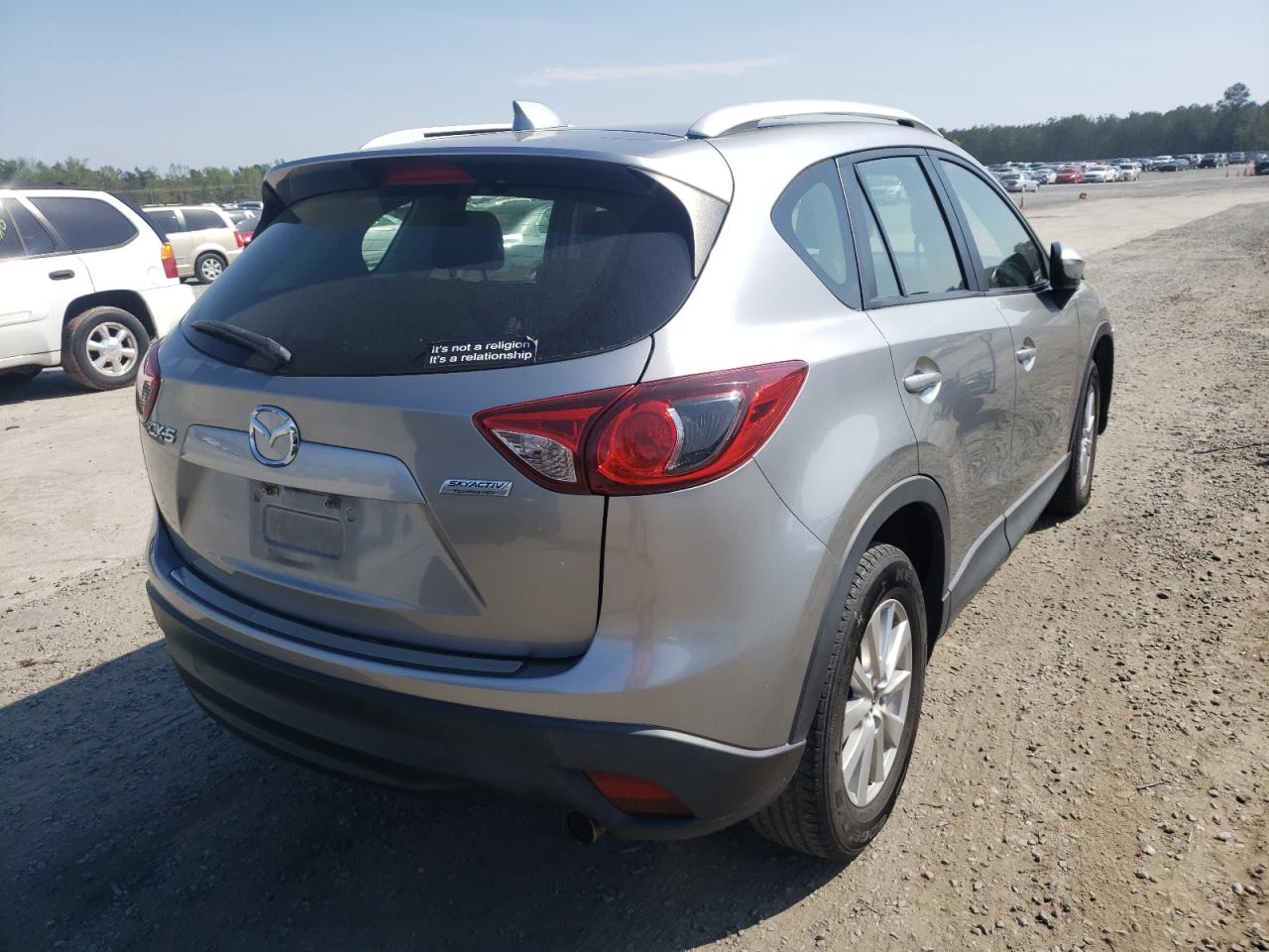 Photo 4 from auction – 2015 MAZDA CX-5 SPORT with VIN JM3KE2BE0F0511156