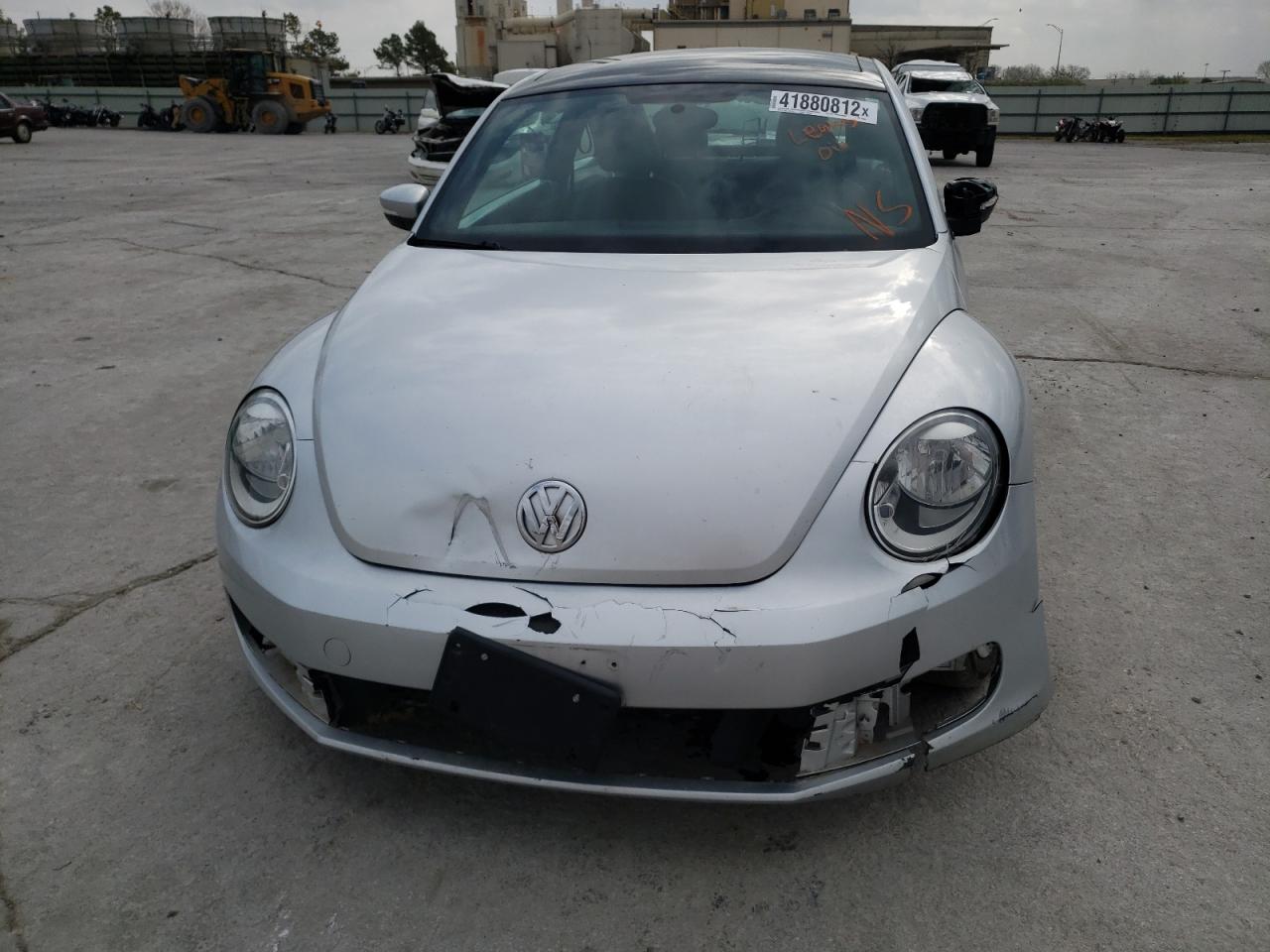 Photo 9 from auction – 2012 VOLKSWAGEN BEETLE with VIN 3VWJX7AT2CM658340