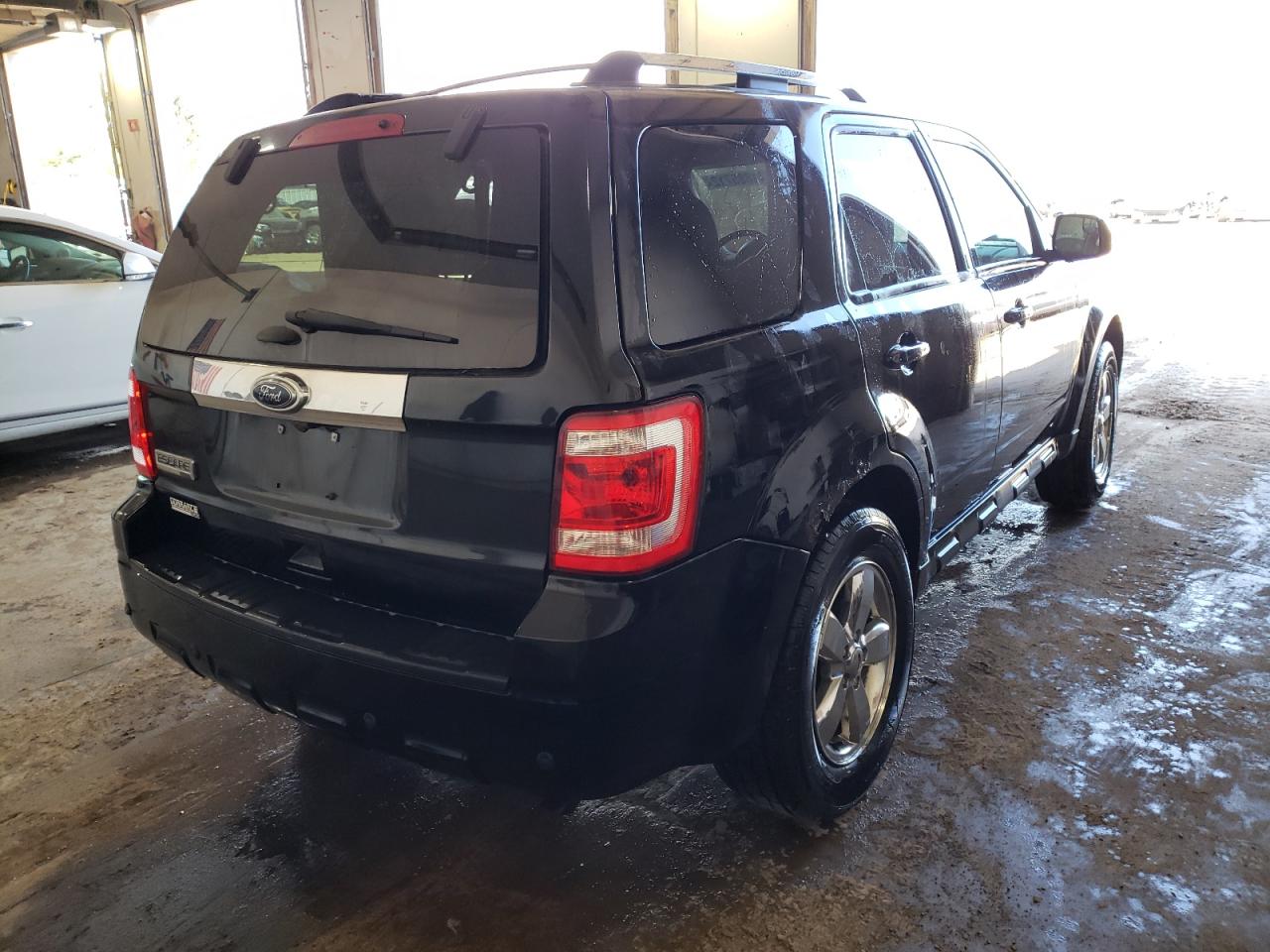 Photo 4 from auction – 2012 FORD ESCAPE LIM with VIN 1FMCU9E79CKA83010