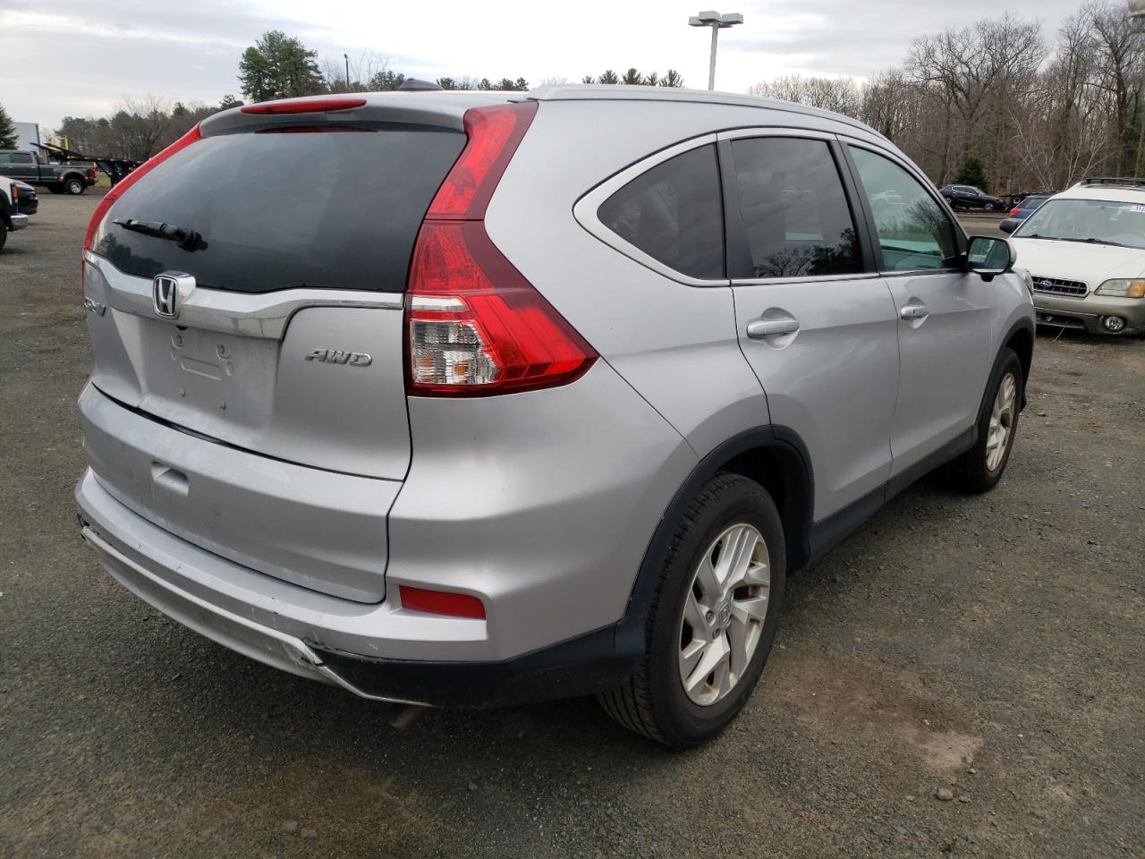 Photo 4 from auction – 2016 HONDA CR-V EXL with VIN 2HKRM4H78GH679632