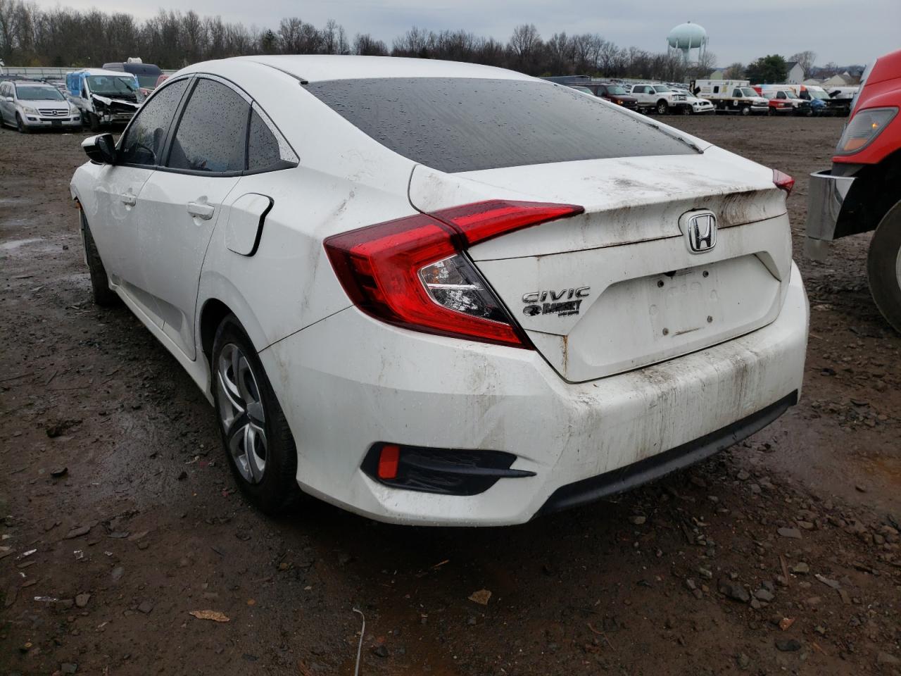 Photo 3 from auction – 2018 HONDA CIVIC LX with VIN 2HGFC2F51JH533019