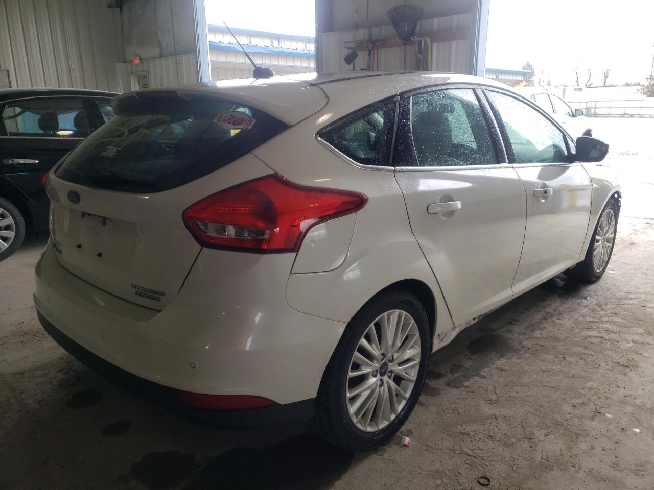 Photo 4 from auction – 2016 FORD FOCUS TITA with VIN 1FADP3N21GL295312