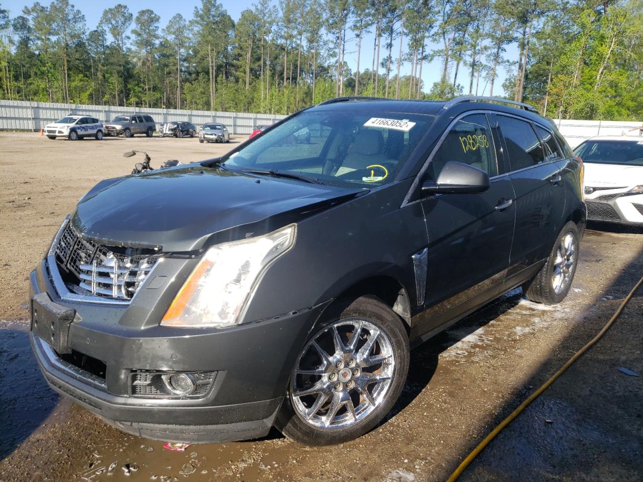 Photo 2 from auction – 2014 CADILLAC SRX PREMIU with VIN 3GYFNDE34ES570647