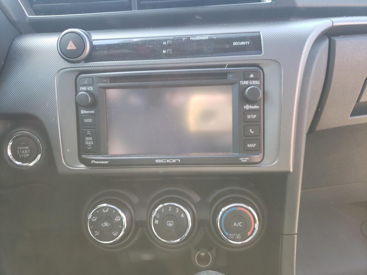 Photo 9 from auction – 2014 TOYOTA SCION TC with VIN JTKJF5C70E3084683