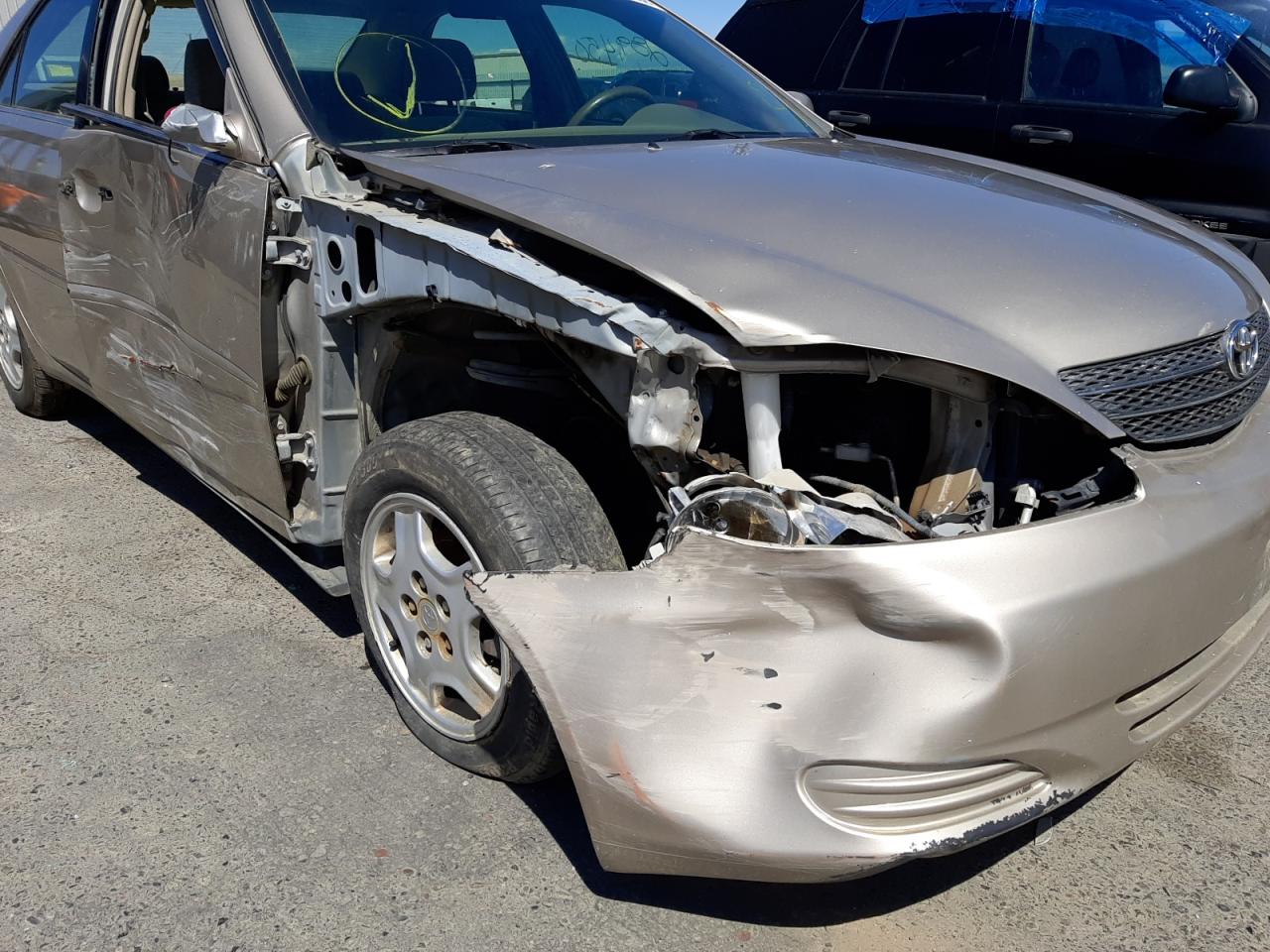 Photo 9 from auction – 2003 TOYOTA CAMRY LE with VIN 4T1BF30K43U556508
