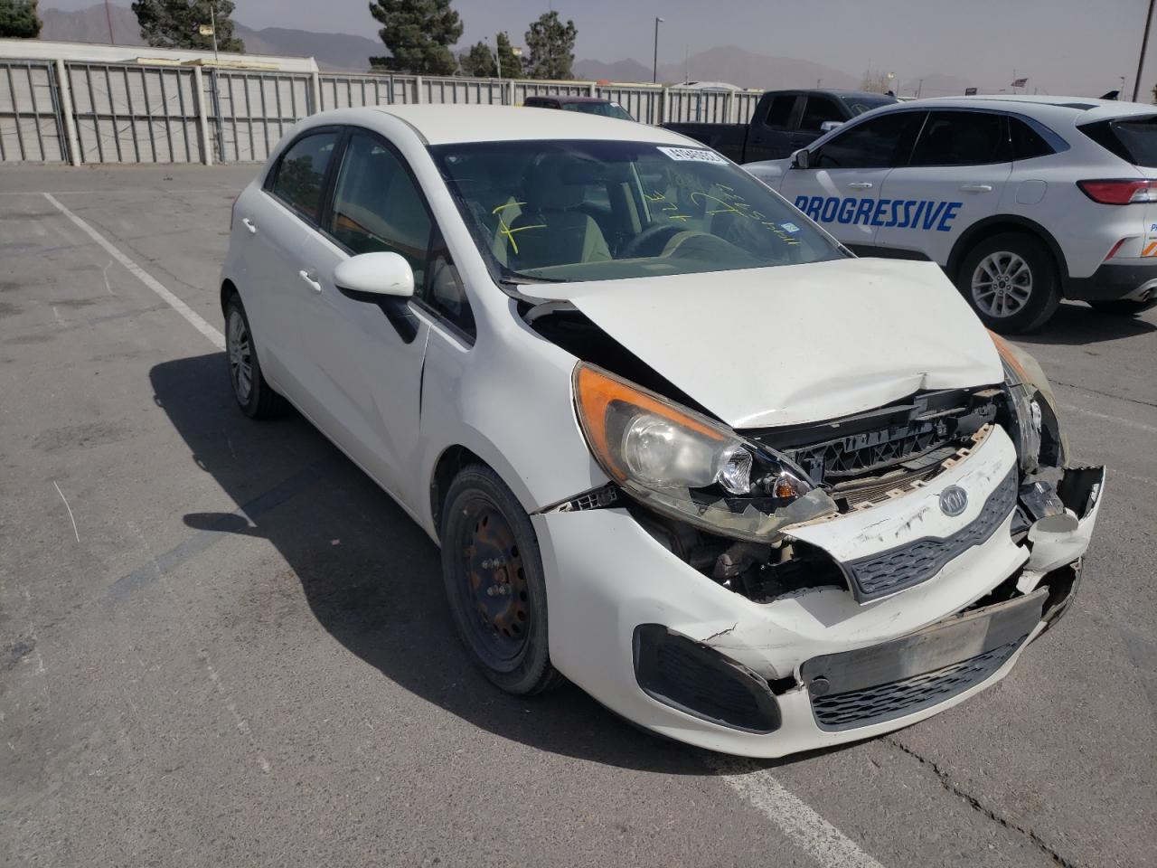 KIA RIO LX 2012 con VIN KNADM5A39C6090906 - Foto de la subasta