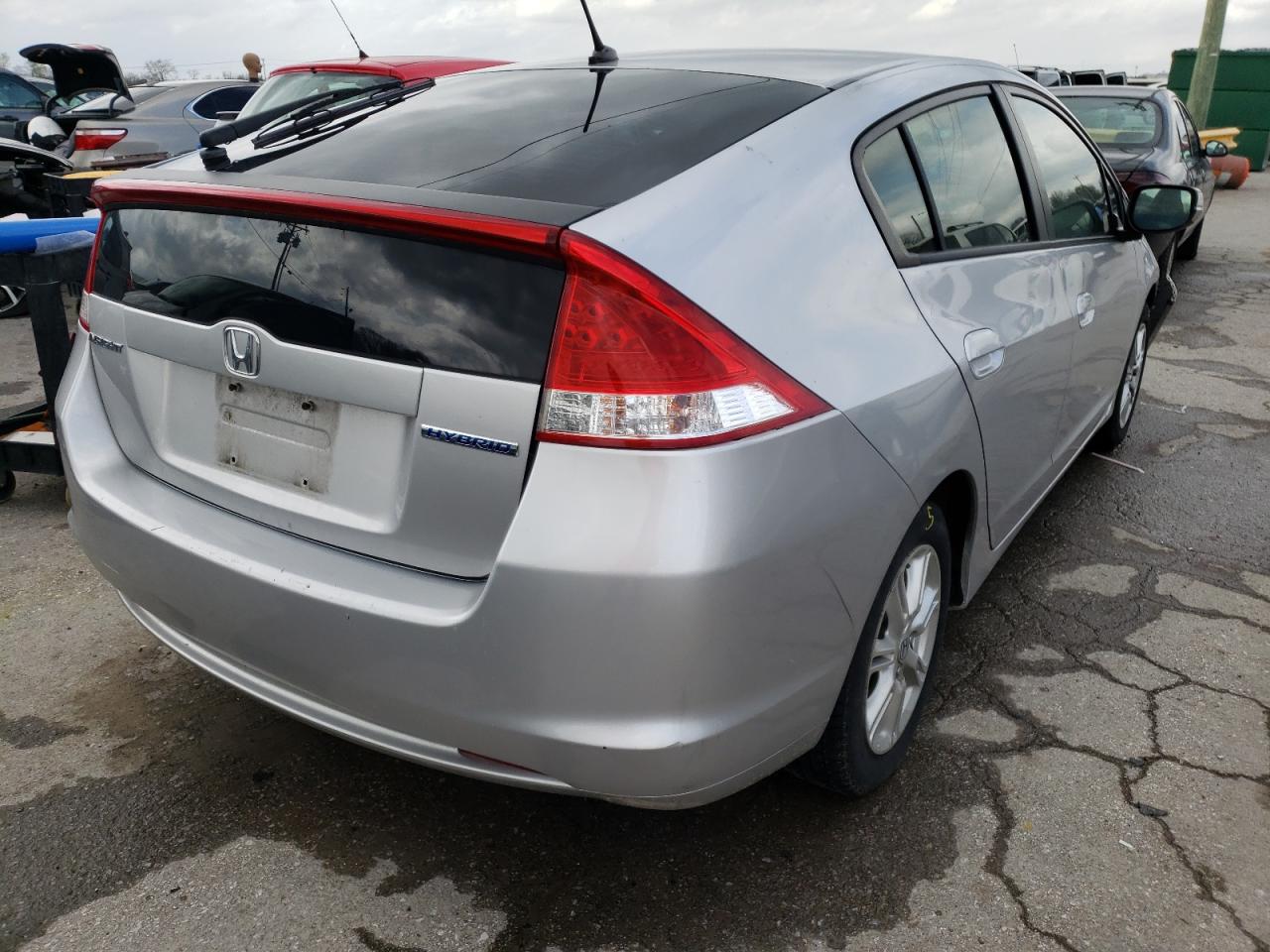 Photo 4 from auction – 2011 HONDA INSIGHT EX with VIN JHMZE2H74BS003821