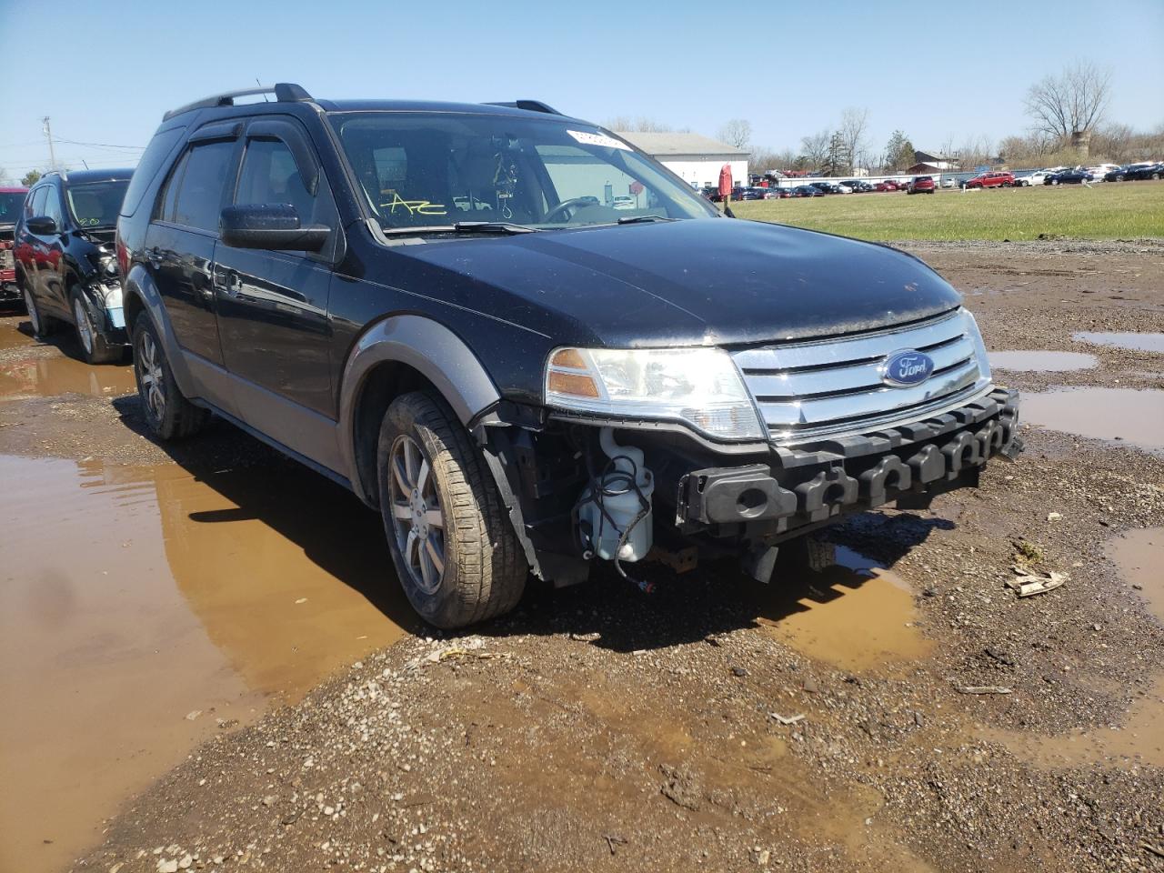 FORD TAURUS X S 2008 with VIN 1FMDK02W08GA02052 - Photo from auction