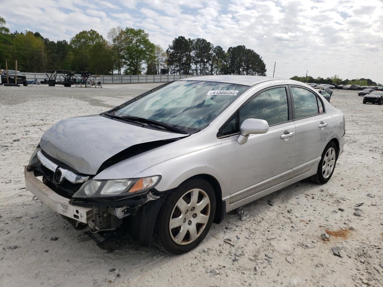 Photo 2 from auction – 2011 HONDA CIVIC LX with VIN 2HGFA1F57BH503377