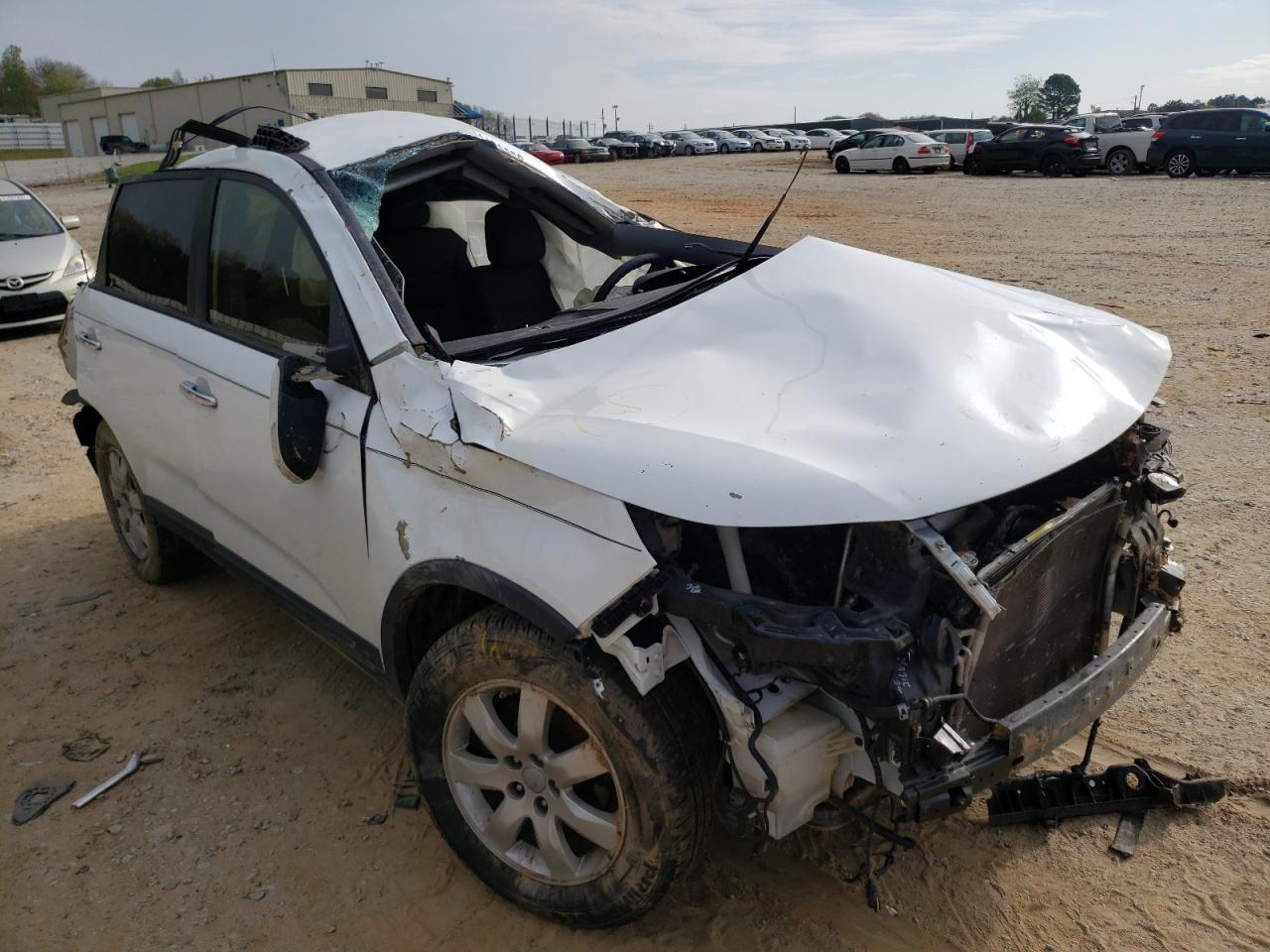 KIA SORENTO LX 2013 with VIN 5XYKT4A20DG352986 - Photo from auction
