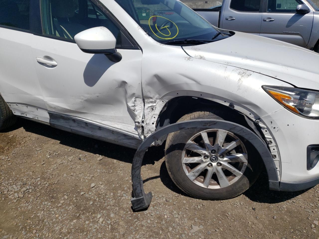 Photo 9 from auction – 2014 MAZDA CX-5 TOURI with VIN JM3KE2CY4E0364699