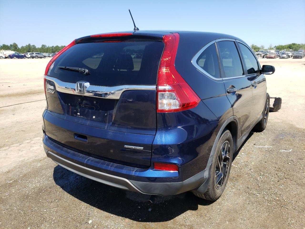 Photo 4 from auction – 2016 HONDA CR-V SE with VIN 2HKRM3H45GH557097