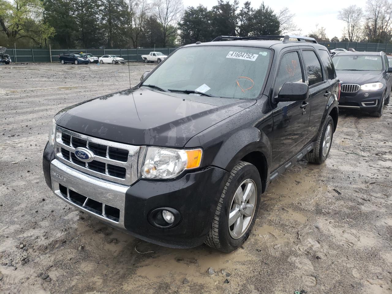 Photo 2 from auction – 2011 FORD ESCAPE LIM with VIN 1FMCU0E76BKA96646